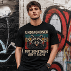 Men'S Funny Raccoon Graphic T-Shirt - "Undiagnosed But Something Ain't Right"