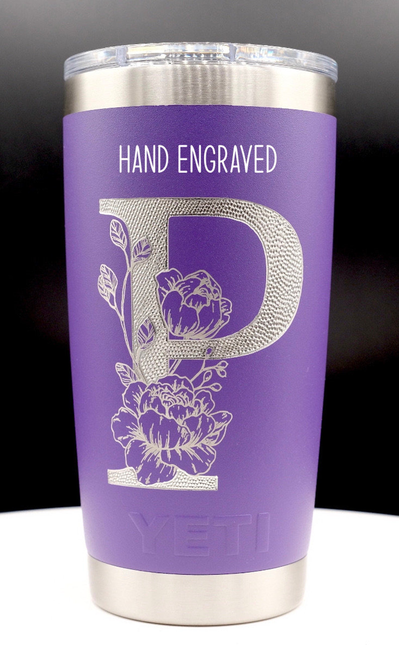 Single letter floral monogram laser or hand engraved on a 20oz Yeti tumbler. Dishwasher safe.... These are NOT sticker’s or vinyl decals!